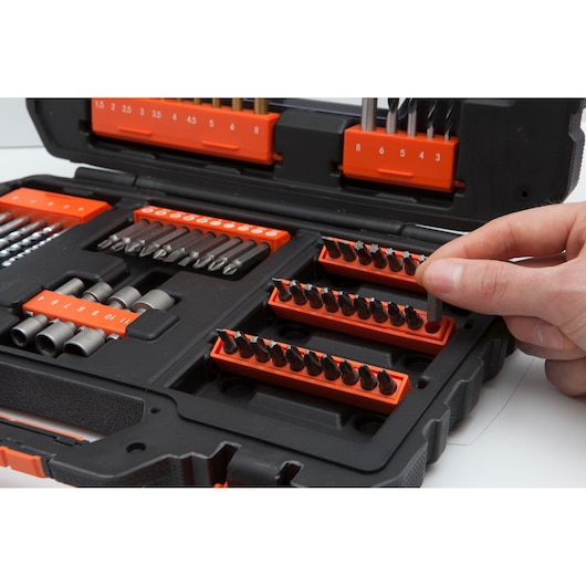 BLACKDECKER A7231 drill and screwdriver bit set in black case, hand selecting a bit, photo of contents.
