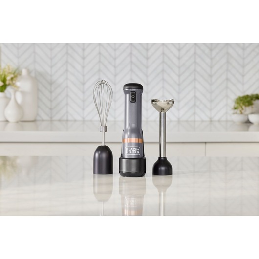 BLACK+DECKER BCKM1012KG hand blender set with whisk and blending attachment on kitchen counter.