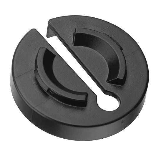 A close-up image of a black, round plastic accessory part with a distinct slot and curved interior sections, photographed on a white background.