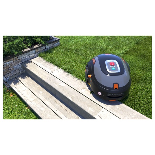 BLACKDECKER BCRMW122 robotic lawn mower on grass near stone steps, outdoor photography.