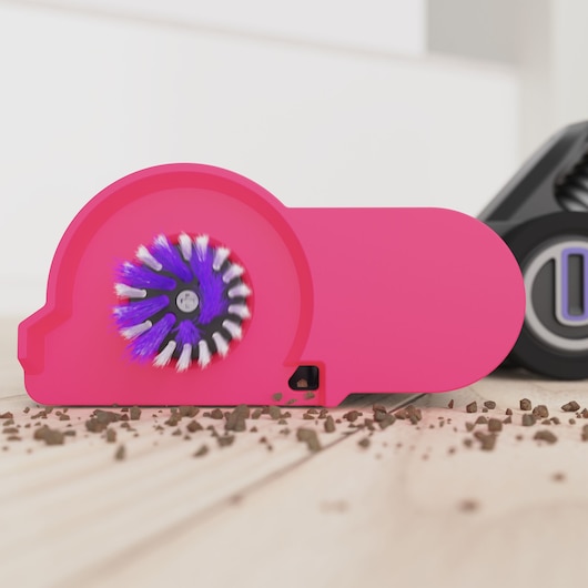 BLACKDECKER BHFEA640WP vacuum accessory in pink with rotating brush cleaning debris on wooden floor, front angle.