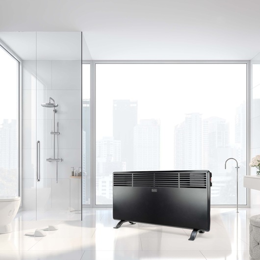 BLACKDECKER BXCSH1800E black convection heater in a modern bathroom, floor view, photography