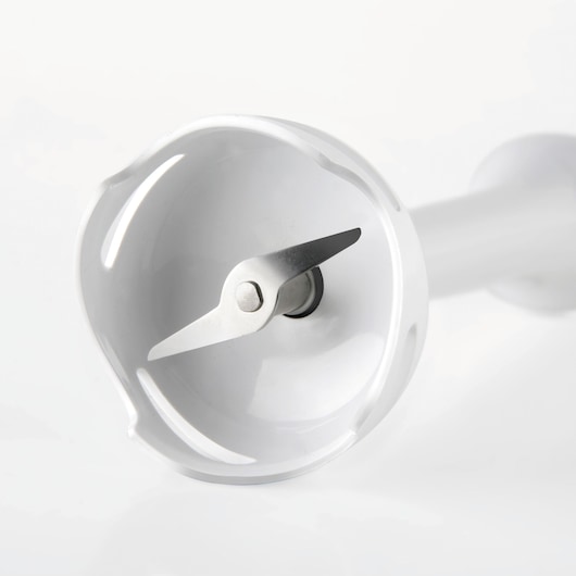 BLACKDECKER BXHB500E hand blender close-up showing sharp stainless steel blades, product facing down on white background.
