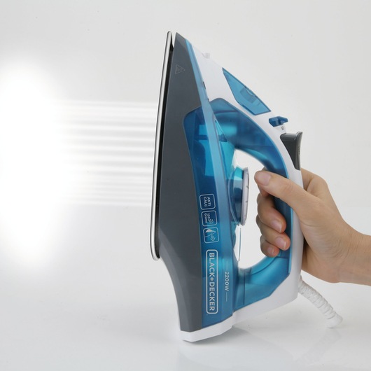BLACK+DECKER BXIR2200E steam iron side view, blue and grey, held in hand, white background.