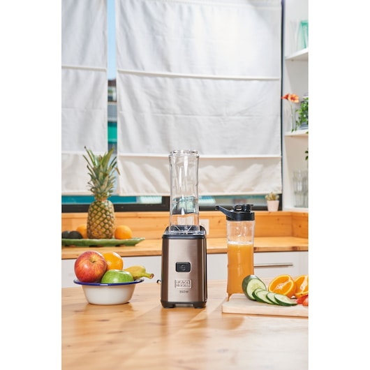 BLACKDECKER BXJBA350E blender in kitchen with fruits and smoothie bottle.