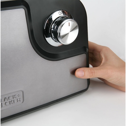 Photo of BLACKDECKER BXMM1000E mixer control knob in stainless steel with hand adjusting setting.