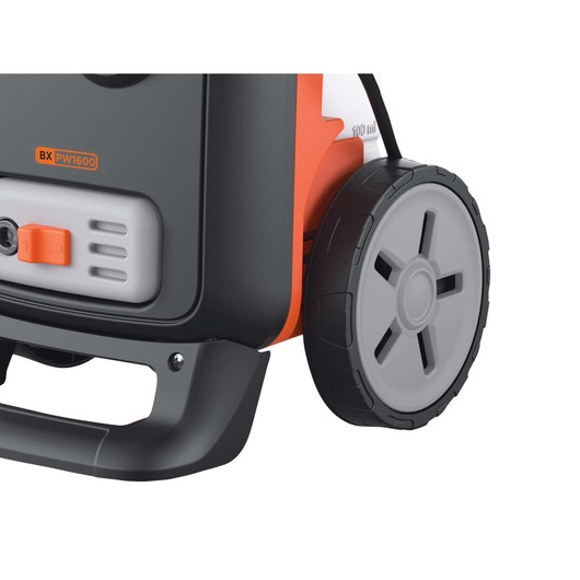 BLACKDECKER BXPW1600E pressure washer close-up, showing grey and orange plastic body and large textured wheel.