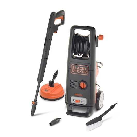 A BLACK+DECKER pressure washer model BXPW1700PE, shown with accessories including a spray gun, a round surface cleaner, a connector, and a cleaning brush. The unit is black and orange with wheels and a hose reel.