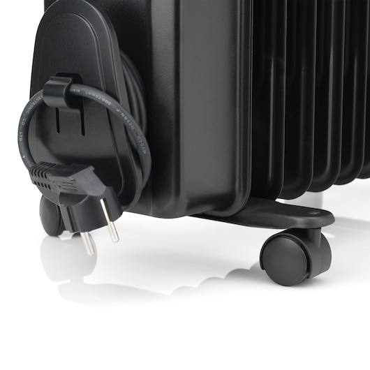 BLACKDECKER BXRA1500E black electric radiator close-up, showing power cord wrapped around holder and caster wheel.