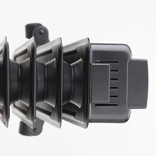 BLACKDECKER BXRA1500E close-up side view of black plastic component with vented details and ribbed structure.