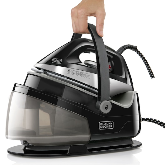 BLACK+DECKER BXSS2200E steam generator iron, black and silver, side angle with hand holding handle, on white background.