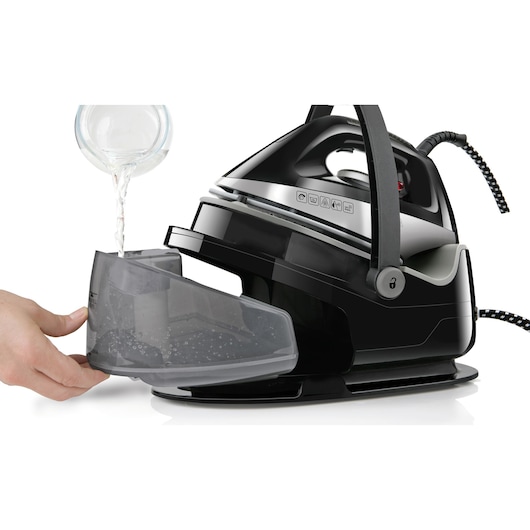 BLACKDECKER BXSS2200E steam generator iron, side angle, water tank being filled.