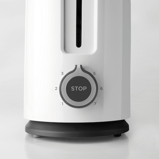 BLACKDECKER BXTO1001E toaster dial close-up, showing settings 1 to 7 and STOP button, front angle, white background.