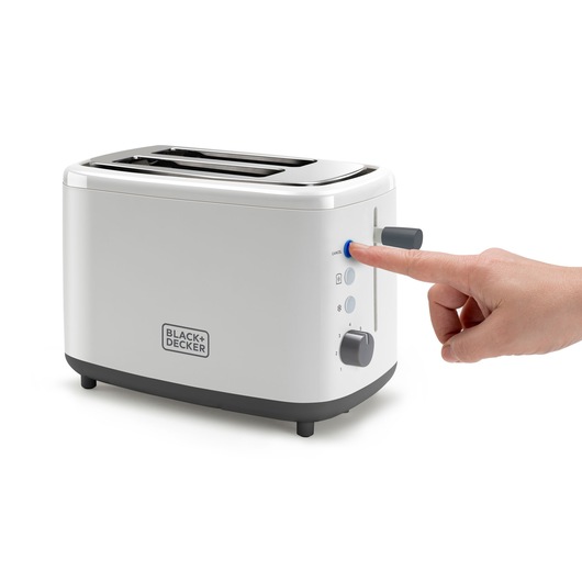 Photo of BLACK+DECKER BXTO820E white two-slice toaster with controls, side view, hand pressing button.