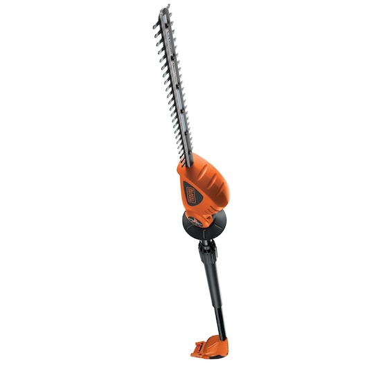 A BLACK+DECKER cordless hedge trimmer with an orange and black design, long blade, and telescopic handle, shown upright against a white background.